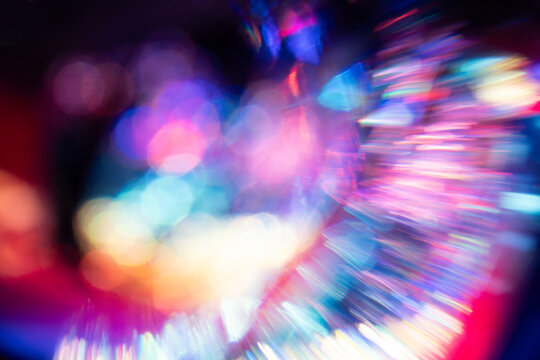 Abstract colorful light burst with bokeh background