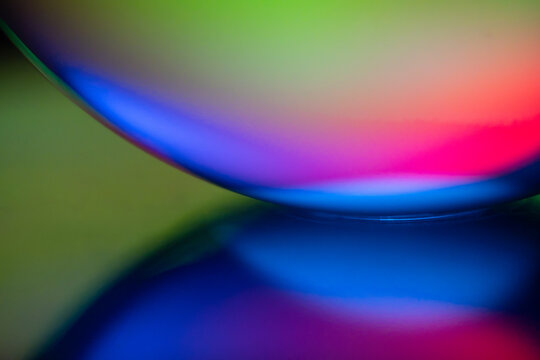 Abstract neon light reflection with colorful blurred gradient