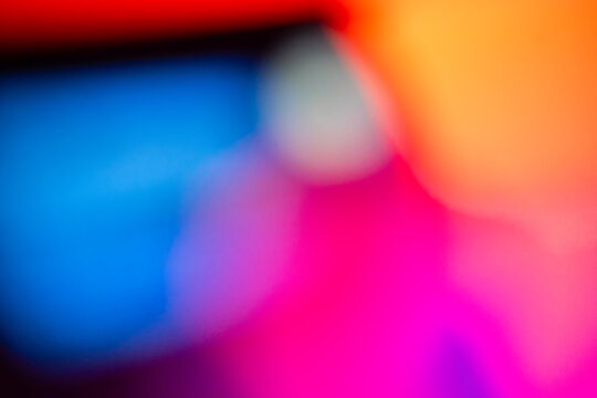 Vibrant blurred abstract background with colorful light