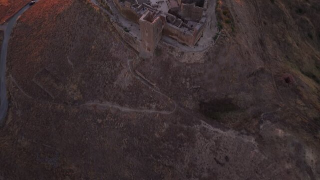 Aerial view around Montearagon Castle in warm evening light