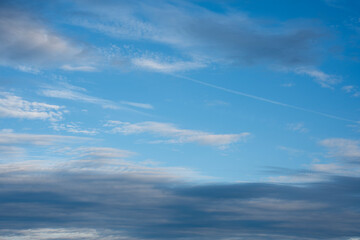 Obraz premium Blue sky with scattered clouds over Norway