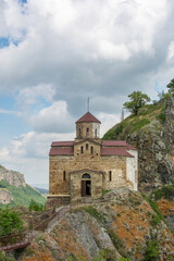 Fototapeta premium Old stone church on a rocky hillside