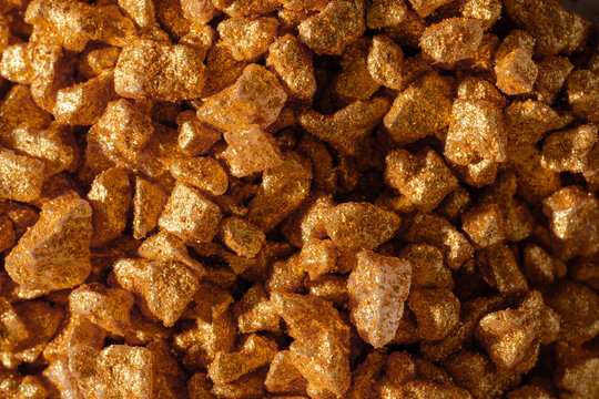 Gold shimmer bath salt crystals background for skin care