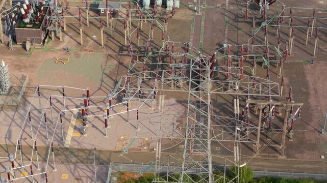 Close-Up Aerial View of High Voltage Substation Components and Transformers