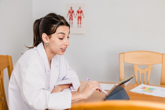 Female doctor providing online telemedicine consultation