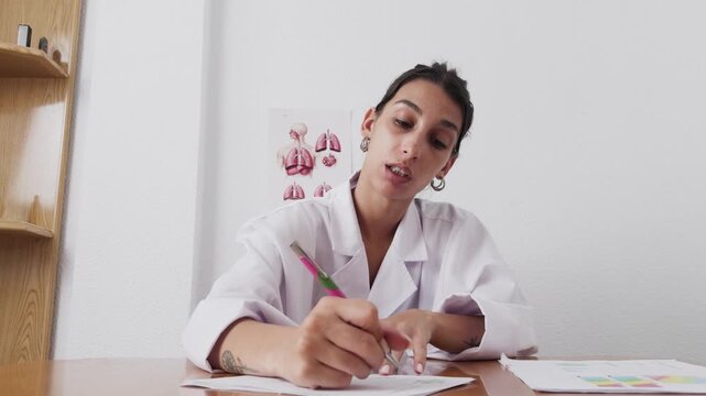 Young latina doctor providing online medical consultation