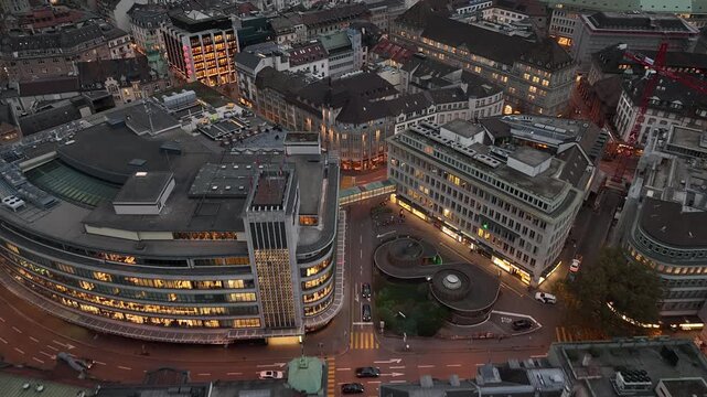 evening time illumination zurich city central area modern office exterior traffic street square aerial panorama 4k switzerland       