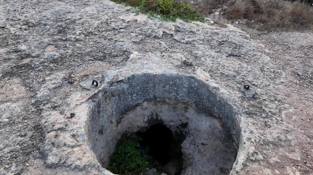 Xemxija, Malta 29.07.2026 - Xemxija Heritage trail, Neolithic tombs dug into the coralline limestone.