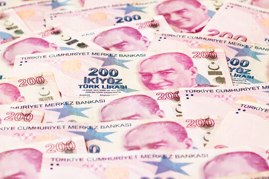 Turkish two hundred lira banknotes were designed with a half-format,monetary background