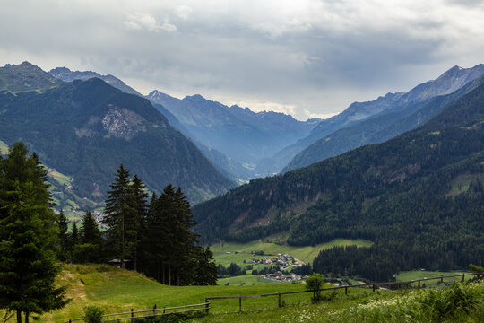 Mountain valley with pine forest and alpine village, Austria, Tyrol, Zams, 29 June 2026