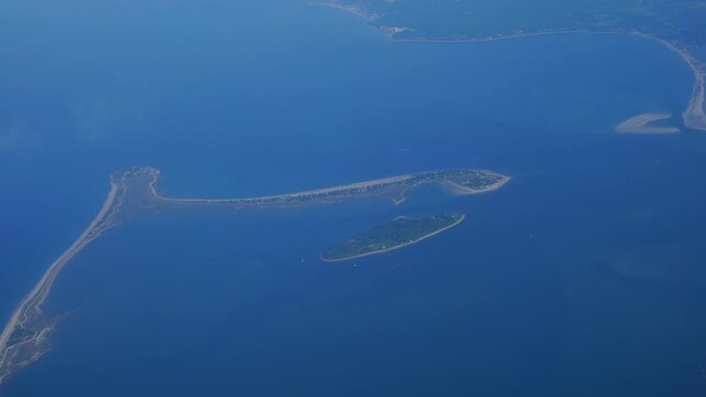The area shown in the aerial image encompasses Clark's Island, Saquish Neck, and Gurnet Point, located at the entrance of Plymouth Bay in Plymouth, Massachusetts