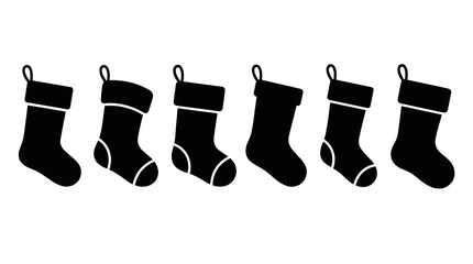 Obraz premium Black Christmas stocking silhouettes.