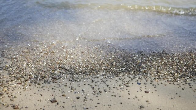  Waves Washing on Shore in Freshwater Lake with Pebbles