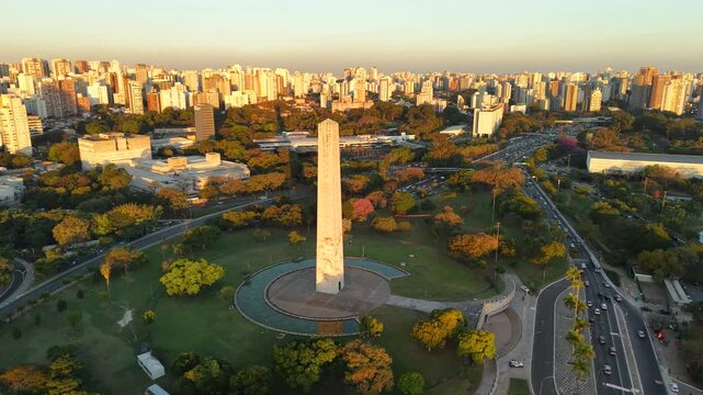 Ibirapuera Obelisk illuminated at nigh, in S&atilde;o Paulo, Brazil - stands out as one of the most emblematic monuments in the city and pays homage to the heroes of the 1932 Constitutionalist Revolution