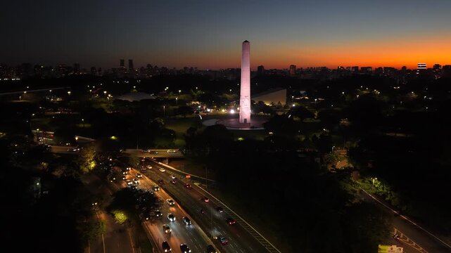Ibirapuera Obelisk illuminated at night, in S&atilde;o Paulo, stands out as one of the most emblematic monuments in the city and pays homage to the heroes of the 1932 Constitutionalist Revolution