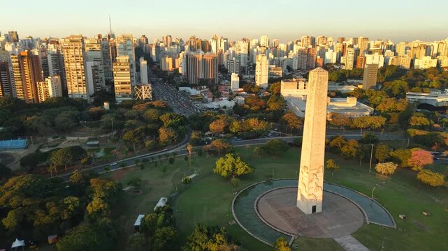 Ibirapuera Obelisk illuminated at nigh, in S&atilde;o Paulo, Brazil - stands out as one of the most emblematic monuments in the city and pays homage to the heroes of the 1932 Constitutionalist Revolution