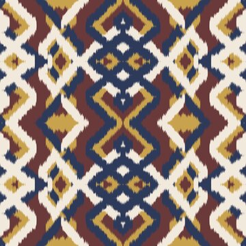 Seamless ethnic ikat pattern with bold navy blue, yellow gold, and terracotta geometric diamond motifs on an ivory accent. Tribal fabric design perfect for bohemian prints, wallpaper, and decor.
