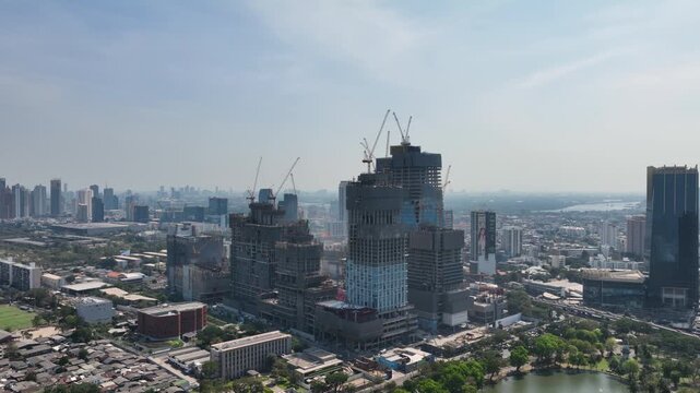 day time bangkok city downtown mega mall complex construction exterior aerial panorama 4k thailand 