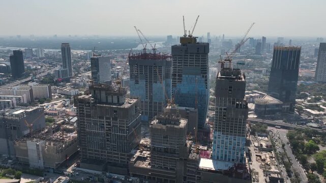 day time bangkok city downtown mega mall office complex construction exterior aerial panorama 4k thailand 