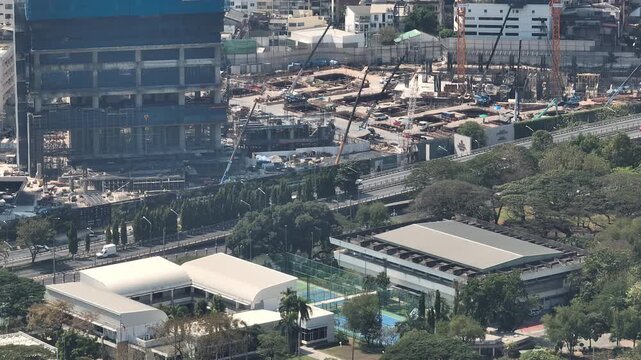 sunny day bangkok city downtown modern office complex construction traffic street aerial panorama 4k thailand 