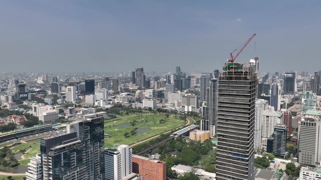 sunny day bangkok city center famous golf course area construction aerial panorama 4k thailand