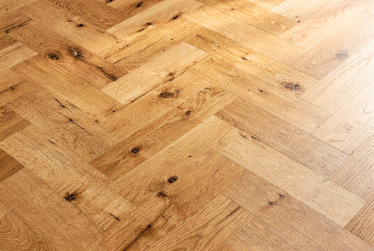 Warm Brown Herringbone Wood Flooring Texture Background