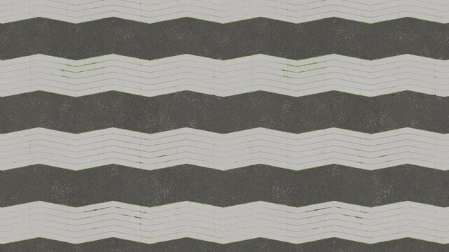 Grungy chevron paving stone pattern offers a seamless loop.