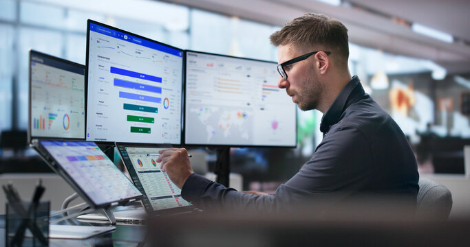 Young Marketing Manager Studies Sales Funnel Data