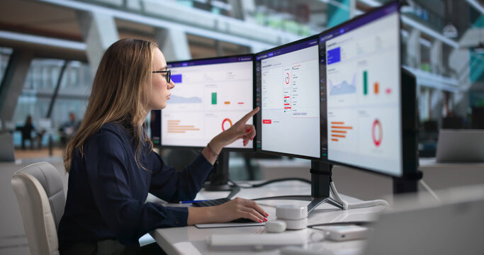 Woman Uses AML Software On Computer