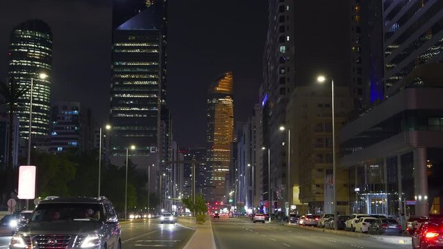 night time illuminated abu dhabi city downtown traffic street center panorama 4k united arab emirates