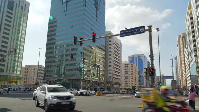 sunny day abu dhabi city center traffic street crossroad panorama 4k united arab emirates