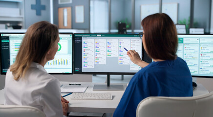 Female Healthcare Scheduler Updates Patient Appointments