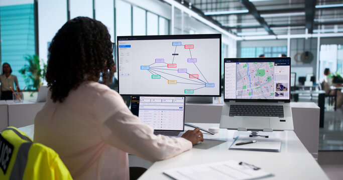 Woman Analyzes Crime Data Charts On Desktop