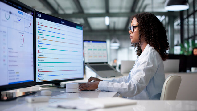 Young African American Woman Tracking OKR Progress