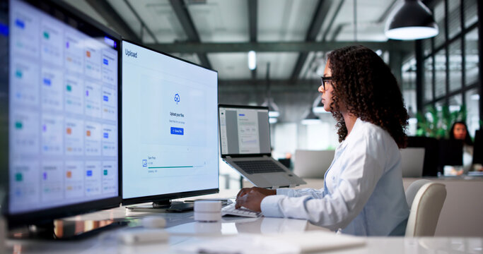 Young Female Cloud Engineer Uploads Secure Data Files