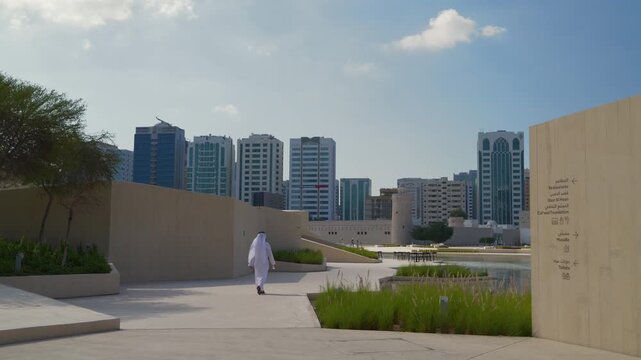 day time abu dhabi city center famous park square slow motion pov panorama 4k united arab emirates