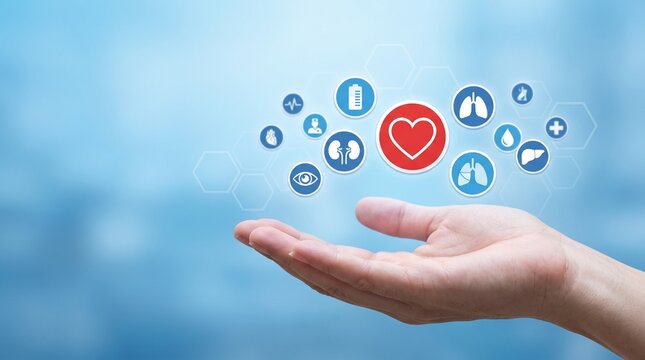 close up young woman hand gesture and show about internal organ donation of human cell on blue background for kindness of living and medical nonprofit concept