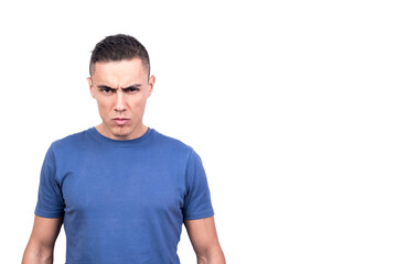 Obraz premium Man standing looking at camera with serious and confrontational expression