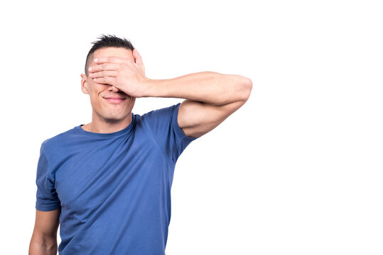 Man covering his eyes with his hand