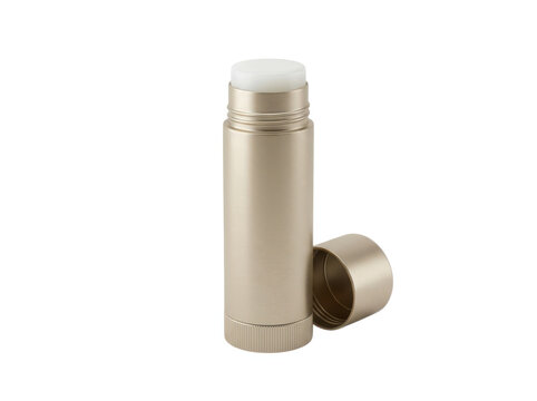 Open gold lip balm stick with cap removed for daily skincare and beauty routine
