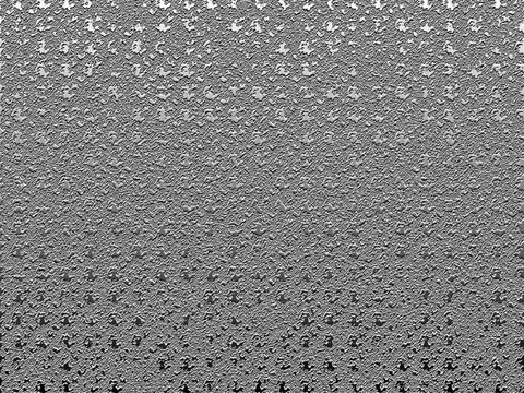 Abstract metallic silver texture with a repeating embossed pattern