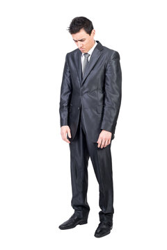 Sad young male manager looking down, transparent background