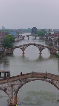 Aerial View of the three bridges in Shuanglin Town at Dusk, Huzhou, Zhejiang Province, China.