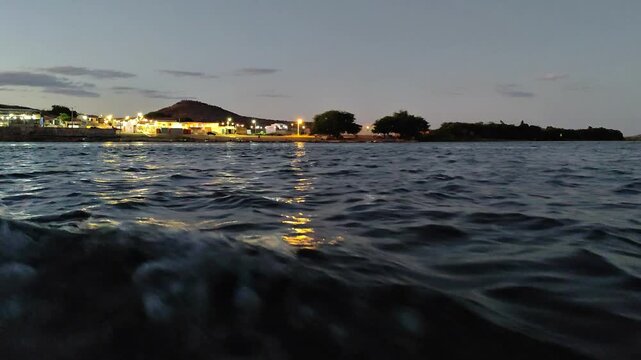 I took a boat trip on the river at dusk with a view of the city, take the one close to the boat.