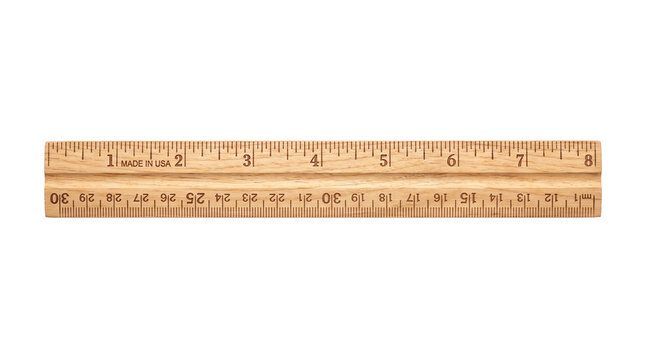 Vintage wooden ruler with imperial and metric scales, classic brown wood measuring stick, school and office stationery for precision drafting isolated PNG with Transparent Background