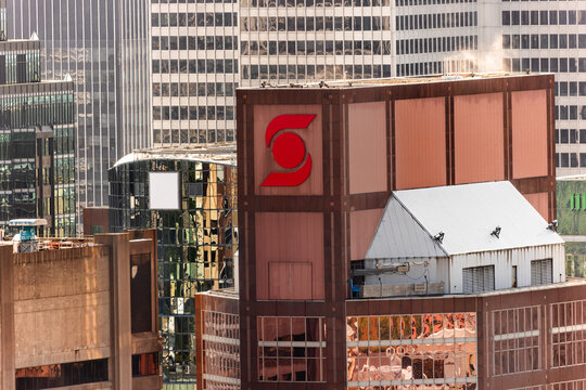 Montreal, QC, Canada. August 01, 2026. Telephoto view of Scotiabank logo on downtown skyscraper rooftop.
