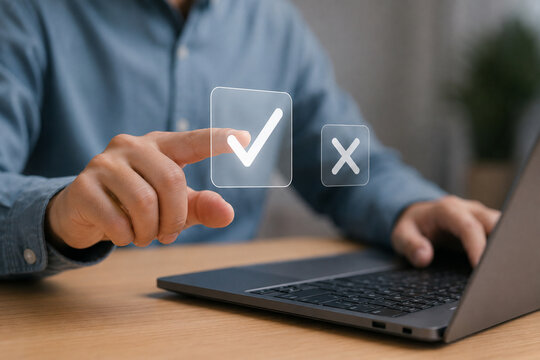 Select the check mark on a laptop. check right and wrong marks. concept decide to choose vote. yes or no decisions, and business options for difficult situations in dilemma.