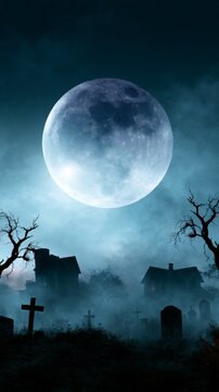 Full moon over eerie graveyard with silhouetted trees and mist
