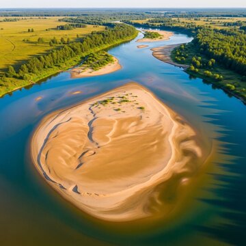Serene Riverbend: Sunlit Sandbar Emerges from Azure Waters Amidst Lush Greenery.