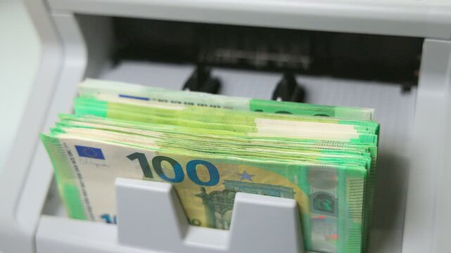 Automatic Money Counting Machine Processing 100 Euro Banknotes